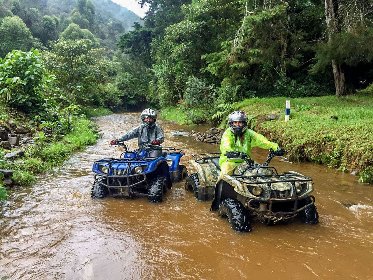 2 atvs in creek