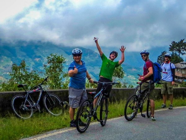 four men on bike tour in medellin