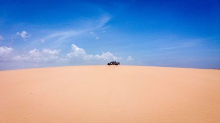 Pickup truck on a Guajira desert dune