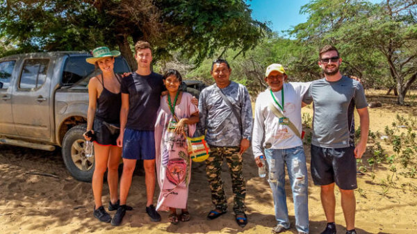 group of tourists with wayuu natives