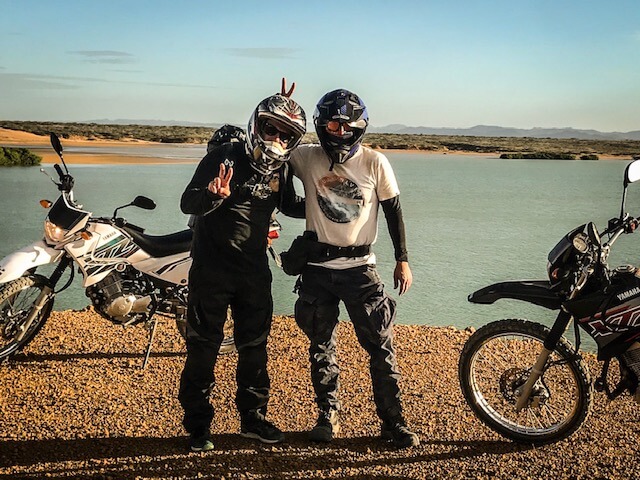 two motorcycle riders in the guajira desert