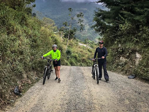 two mountain bikers on a bicycle tour in medellin