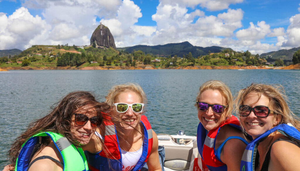 four girls on a boat in lake guatapé