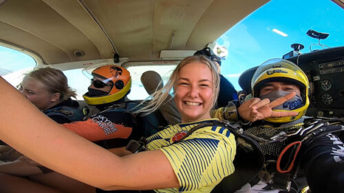 girl in plane ready to tandem skydive cartagena