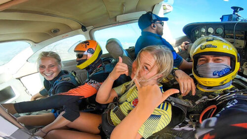 girl in plane ready to skydive