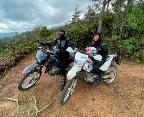 two men on enduro motorcycle tour in colombia
