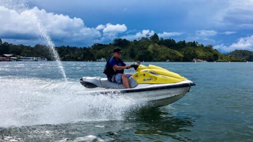 kid on a jetski lake guatape