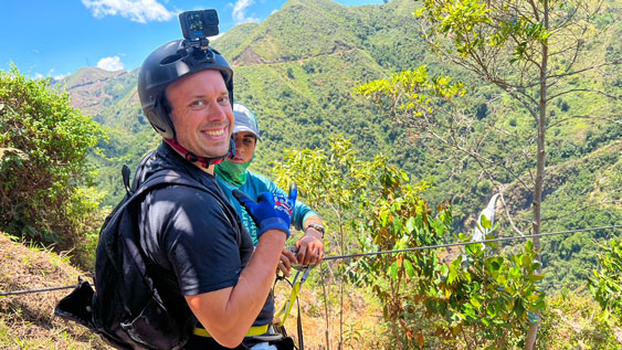 man with helmet cam getting ready to medellin zipline