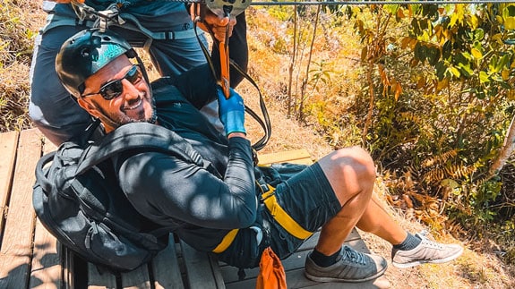 man about to start to zipline