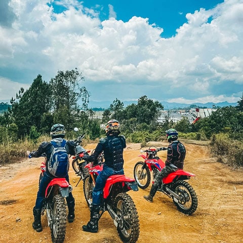 small group of men on a motorcycle tour in Medellin